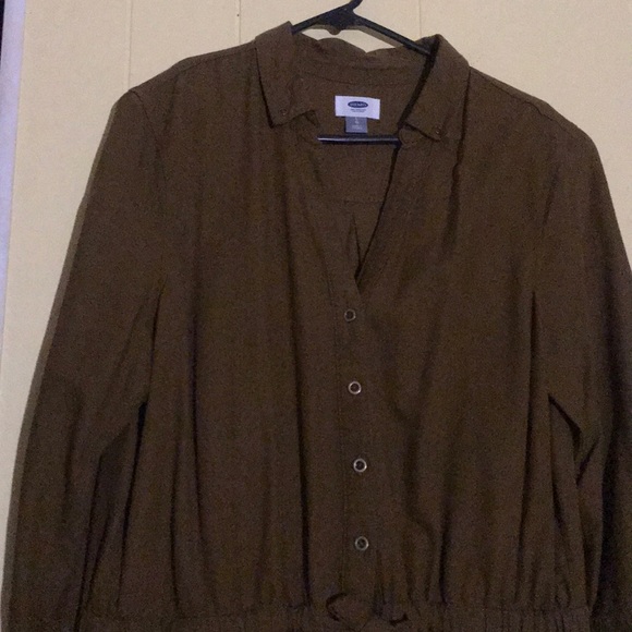 A jump suit with shorts tan like material - Picture 1 of 3